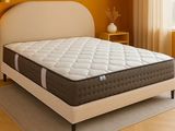 an image of a mattress in a bedroom with a yellow wall