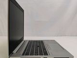 a laptop that is sitting on a white table