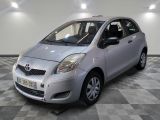 a picture of a silver toyota yaris parked in a garage