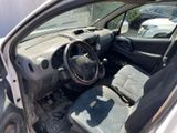 the interior of a car with the door open showing the interior of it