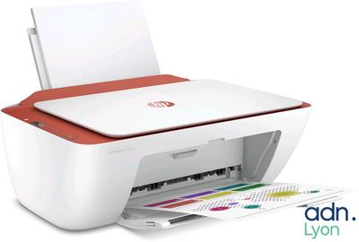 a white printer with a red top and a white printer with a red bottom