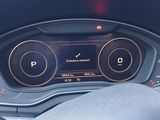 the dashboard of a car with a digital display in the center