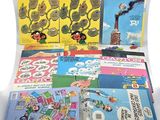 many children ' s books on display on a table