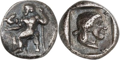 a silver coin with an image of a man on it