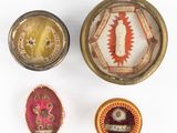 three different types of jewelry are displayed on a white surface