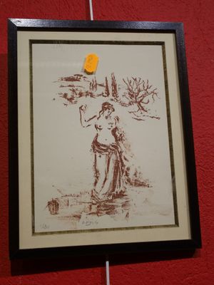 framed drawing of a woman with a bird on her head
