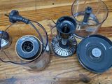 a blender and a blender sitting on a wooden table