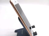 a cell phone that is sitting on a stand