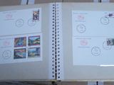 a lot of stamps on the pages of a book