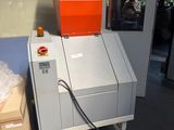 a machine that is sitting on a cart in a room