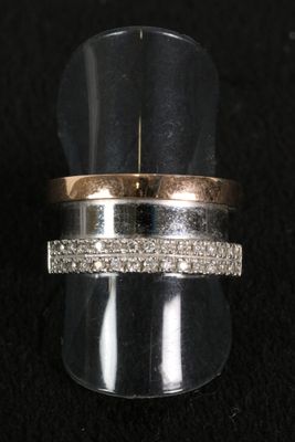 a close up of a ring on a black surface