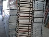 many stacks of metal plates stacked on top of each other