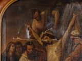 a painting of jesus hanging on the cross with other people