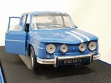 a model of a blue car on a black platform
