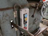 a machine that is sitting inside of a building