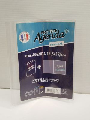 a clear plastic folder with a blue label on the front of it