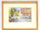 une photo d'un tableau représentant une rue avec des maisons en arrière-plan