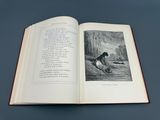 un livre ouvert avec l'image d'un homme et d'un chien