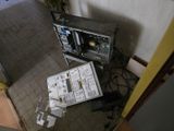 an overhead view of a room with a microwave and a television