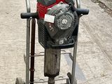 a small machine that is sitting on the ground