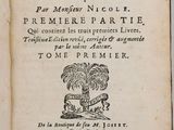 an old book with a picture of a rooster on it ' s cover