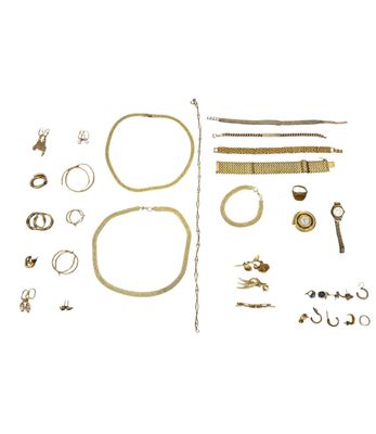 an image of a collection of gold jewelry on a white background