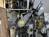 a large engine sitting in the middle of a room