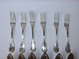 six forks and six spoons arranged in a row