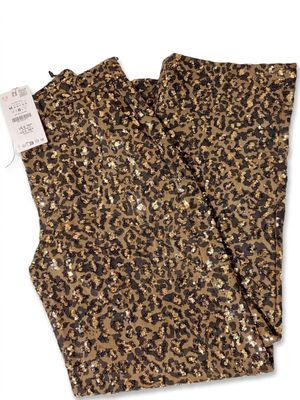 un pantalon à imprimé léopard avec des paillettes dorées