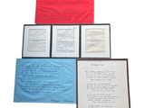 three framed papers and a piece of paper with a poem on it