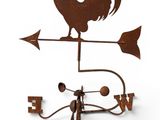 a metal weather vane with a rooster on top of it