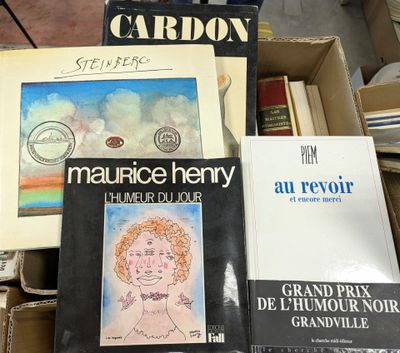 many books that are sitting on a table