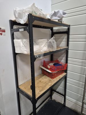 a shelf that has a bunch of items on it