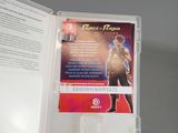 a person holding a book with a picture on it