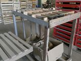 a table that has a bunch of boxes on it