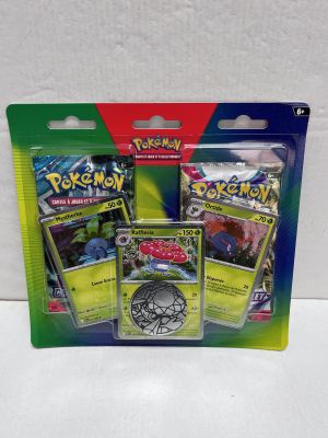 a close up of a package of pokemon cards on a white surface