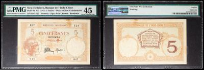 three different types of currency are on display in a display case