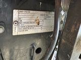 a close up of a metal plate on a motorcycle