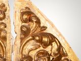 pair of carved wood bookends in the shape of a man and a woman
