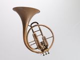 a brass instrument that is flying in the air