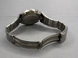 an image of a close up of a wrist watch on a table