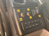a control panel in the driver ' s seat of a vehicle