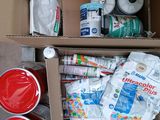 a cardboard box filled with supplies and supplies