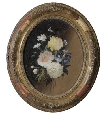 une image représentant un tableau de fleurs dans un cadre doré