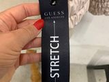 someone holding a tag that says stretch on a mannequin mannequin mannequin mannequin mannequin mannequin mannequin manne