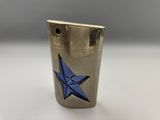 a silver lighter with a blue star on it