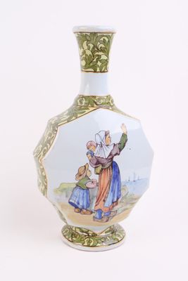 a vase with a picture of a man and a woman on it
