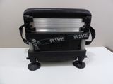 a black suitcase with a black handle on a white table