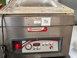a machine that is sitting on a counter in a kitchen