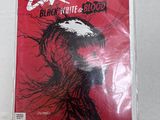 a close up of a comic book on a white surface